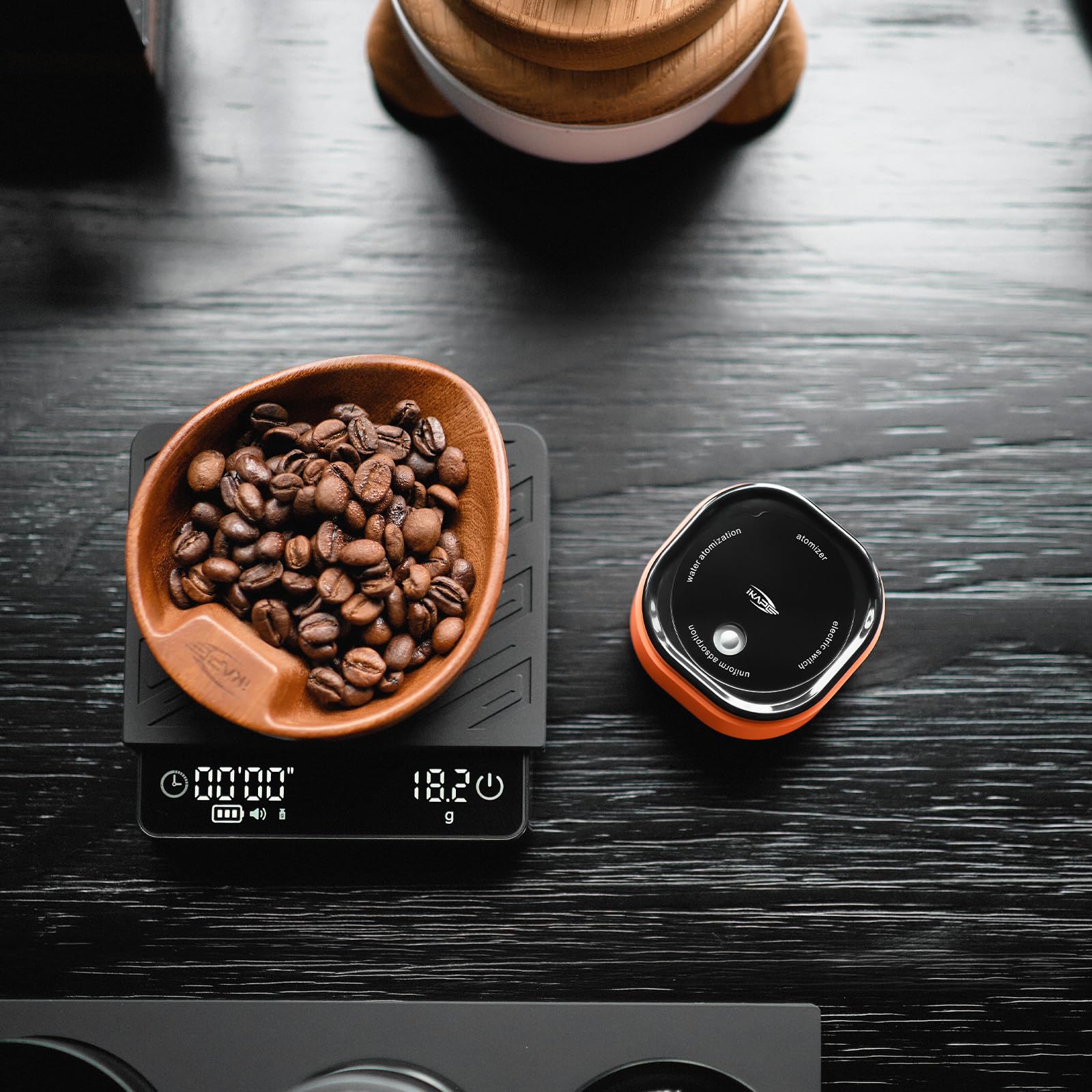 IKAPE espresso tamper 20ml tank shows ample mist capacity for multiple sessions.