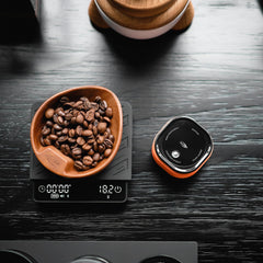 IKAPE espresso tamper 20ml tank shows ample mist capacity for multiple sessions.