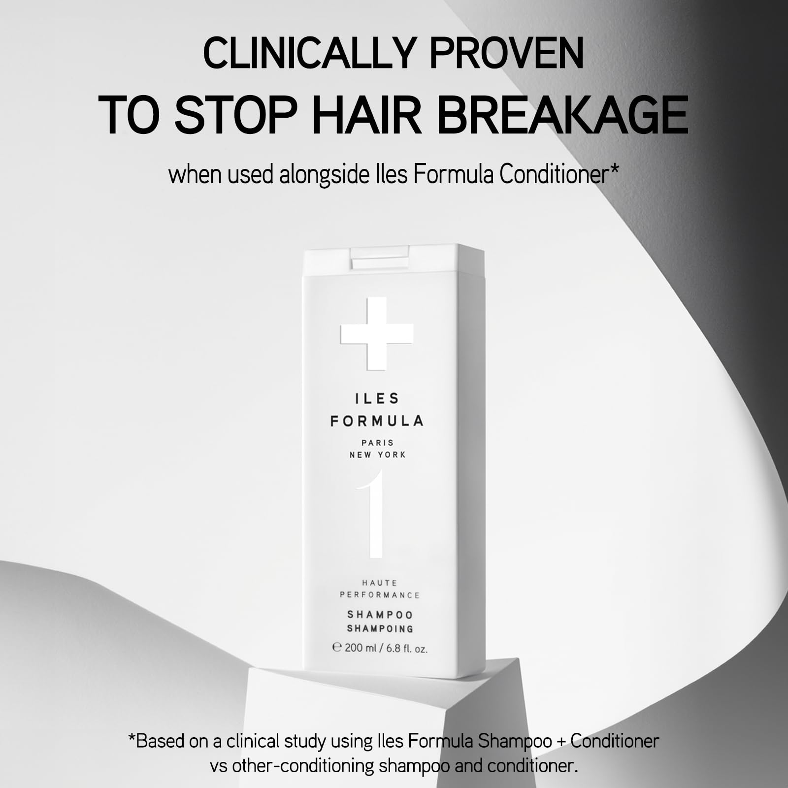 ILES FORMULA Shampoo label closeup highlights salon-grade, silicone-free formula benefits.