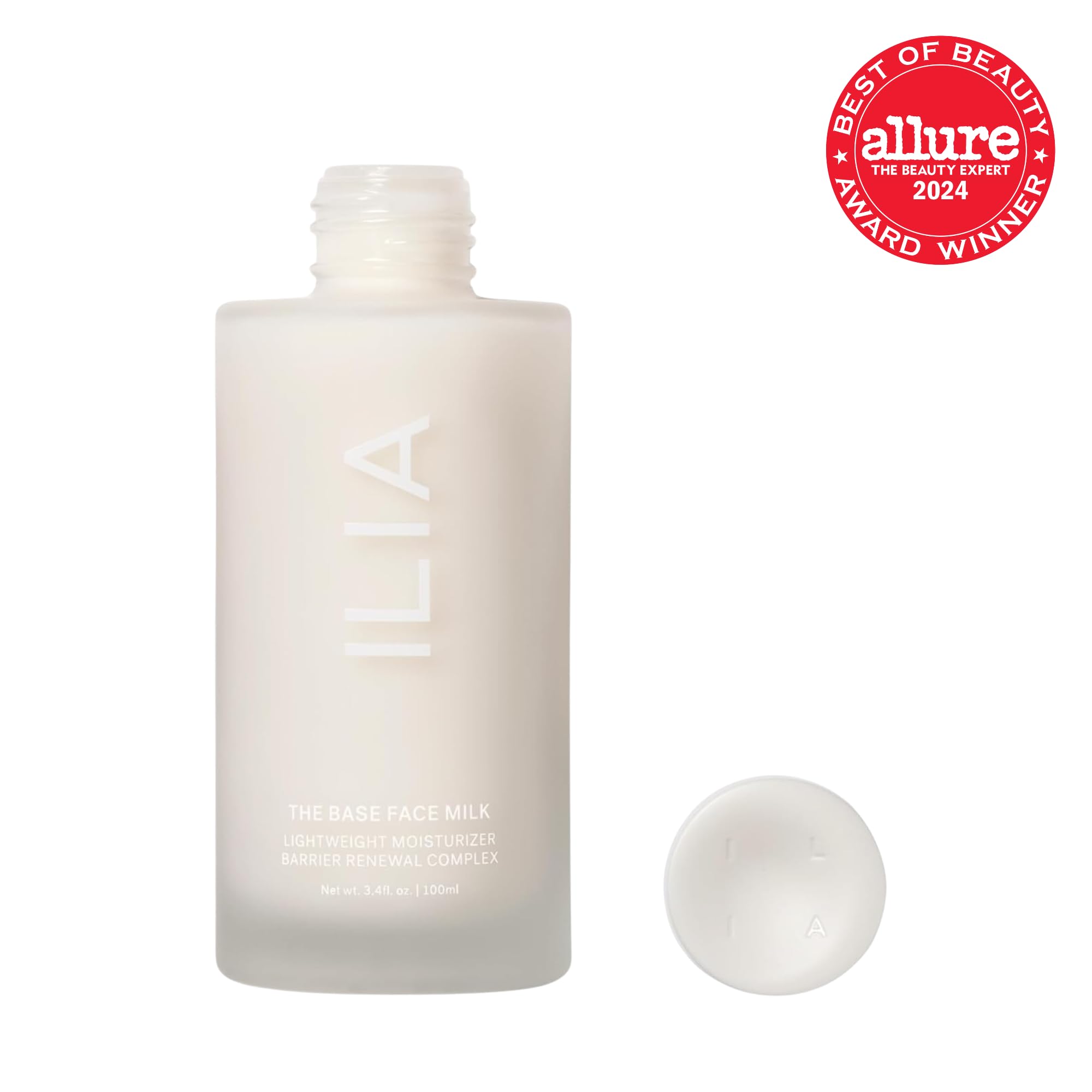 On-skin ILIA Base Face Milk Essence shows dewy, non-greasy hydration.