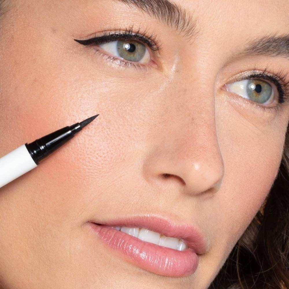 ILIA Clean Line Liquid Liner swatches on arm reveal Midnight Express black.