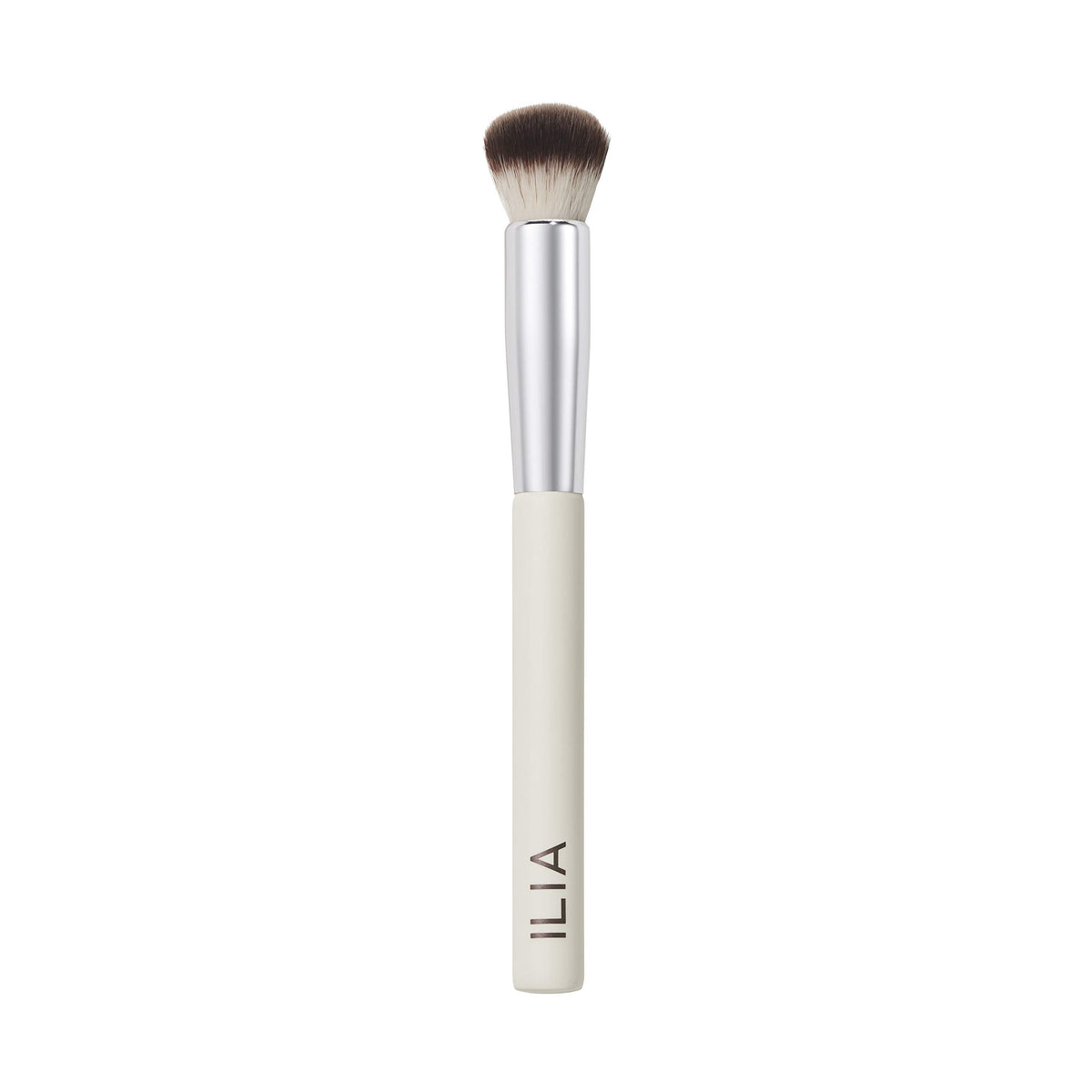 ILIA Complexion Brush with wood handle for precise makeup application on hard-to-reach areas.