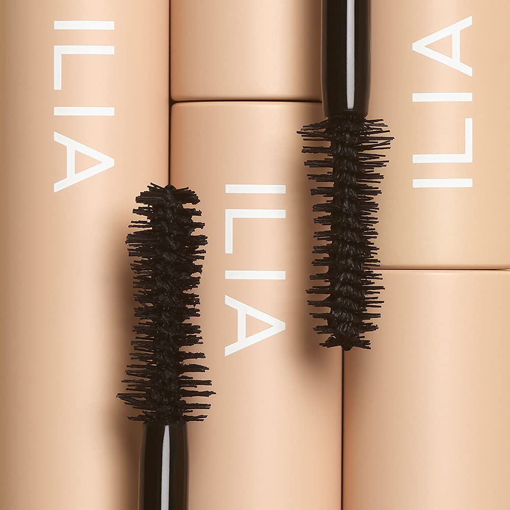 ILIA Fullest Volumizing Mascara on model’s lashes for a fuller look.