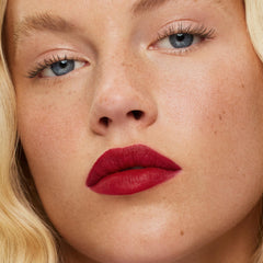 ILIA Lip Sketch Blue Note on lips demonstrates smooth, hydrating color payoff.