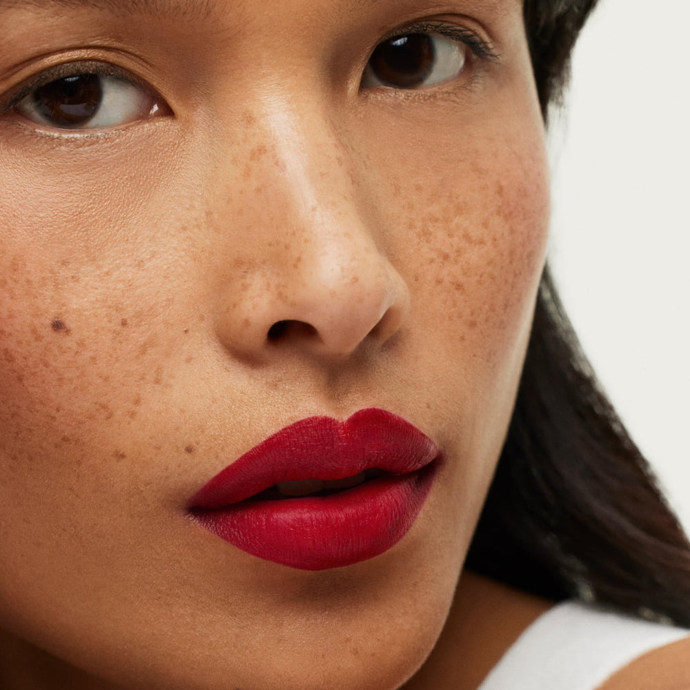 ILIA Lip Sketch Blue Note texture close-up reveals weightless, skin-friendly hydration.