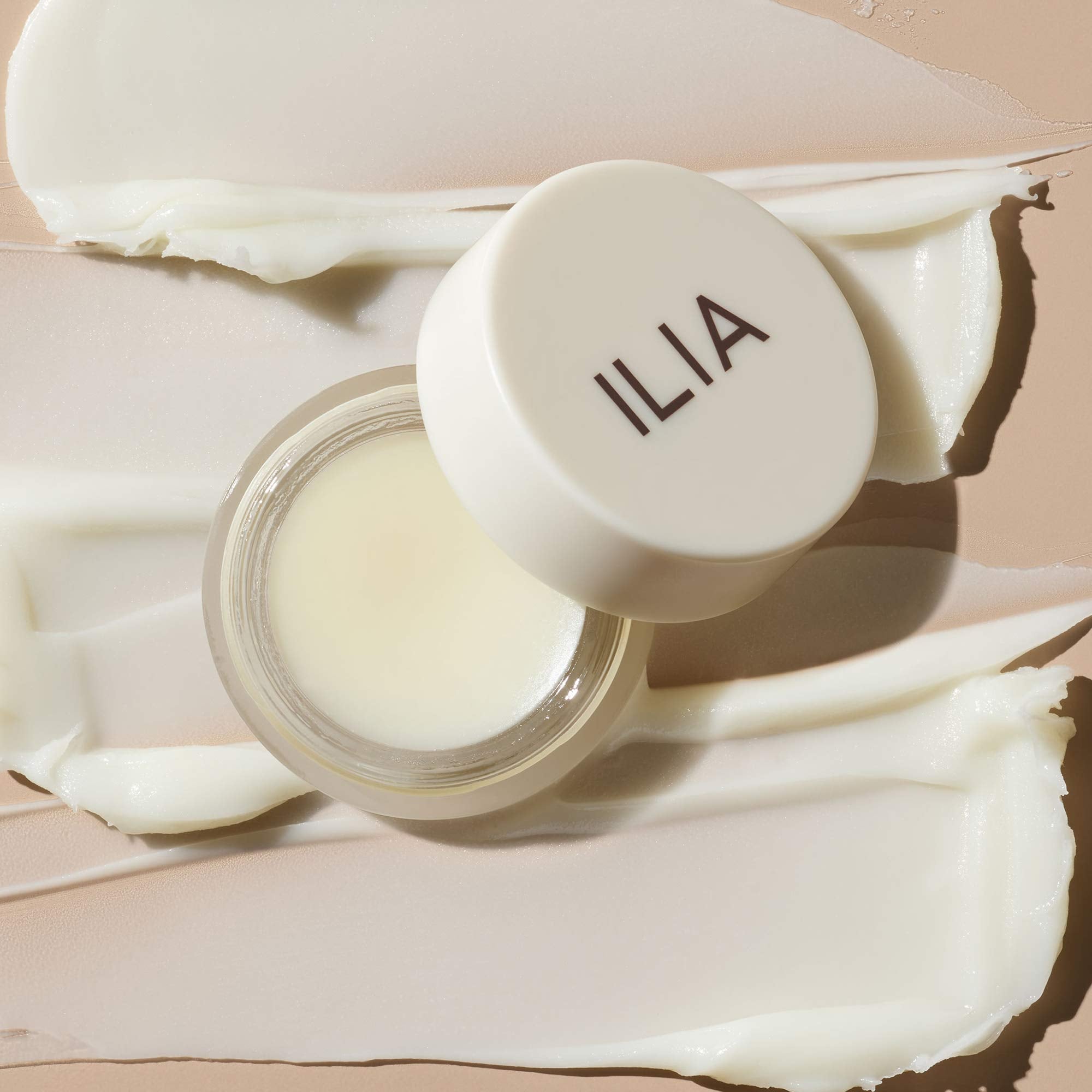 ILIA Lip Wrap texture closeup reveals creamy, cushiony formula for overnight renewal