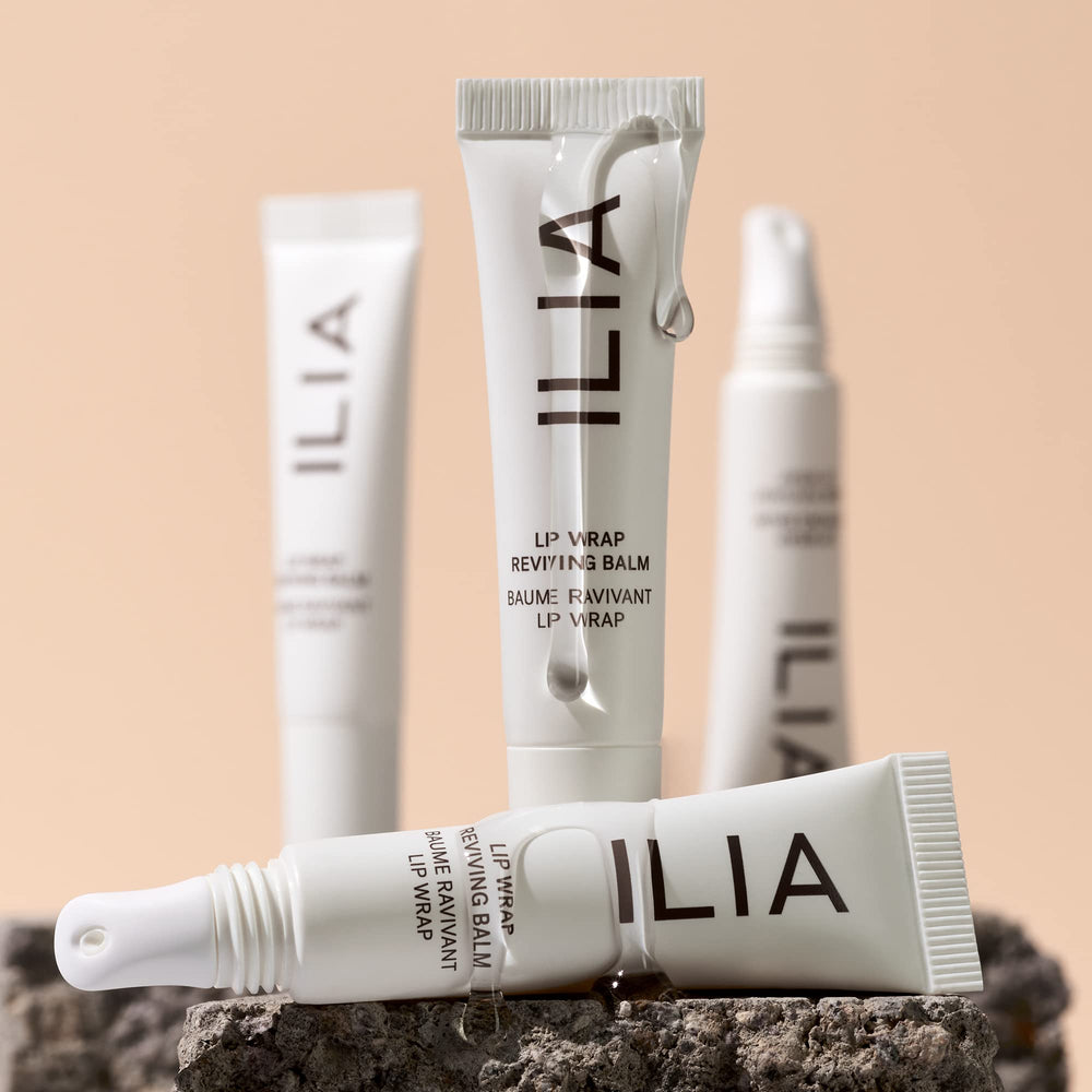 ILIA Lip Wrap Reviving Balm on lips delivers soft glow and instant moisture.