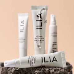 ILIA Lip Wrap Reviving Balm on lips delivers soft glow and instant moisture.