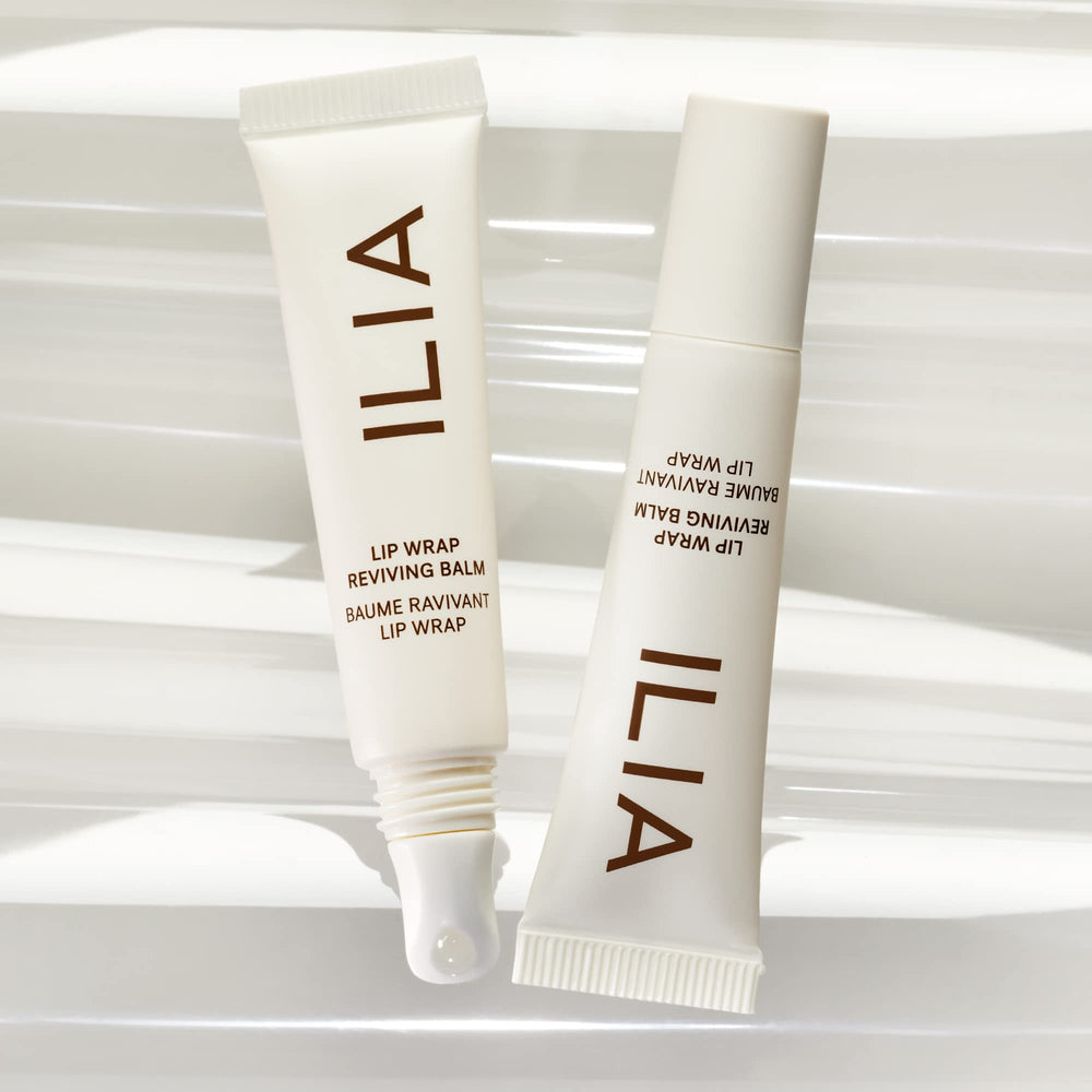 ILIA Lip Wrap Reviving Balm swatch on wrist shows subtle sheen and moisture.