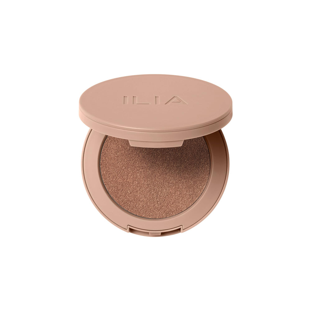ILIA Sunshift Cream Bronzer Eclipse on cheekbone for peachy bronze glow with lasting wear
