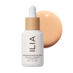 ILIA Super Serum Skin Tint bottle closeup shows dewy skin protection with SPF 40