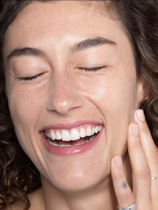 ILIA Super Serum Skin Tint SPF 40 swatch on hand demonstrates sheer-to-buildable coverage and glow.