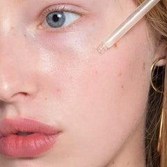 ILIA True Skin Radiant Priming Serum glow-on-skin close-up highlights radiant finish