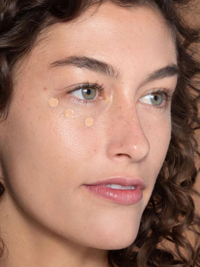 Blemish coverage closeup demonstrates evening of discoloration.
