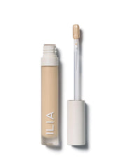 ILIA True Skin Serum Concealer tube close-up with creamy, blendable coverage.