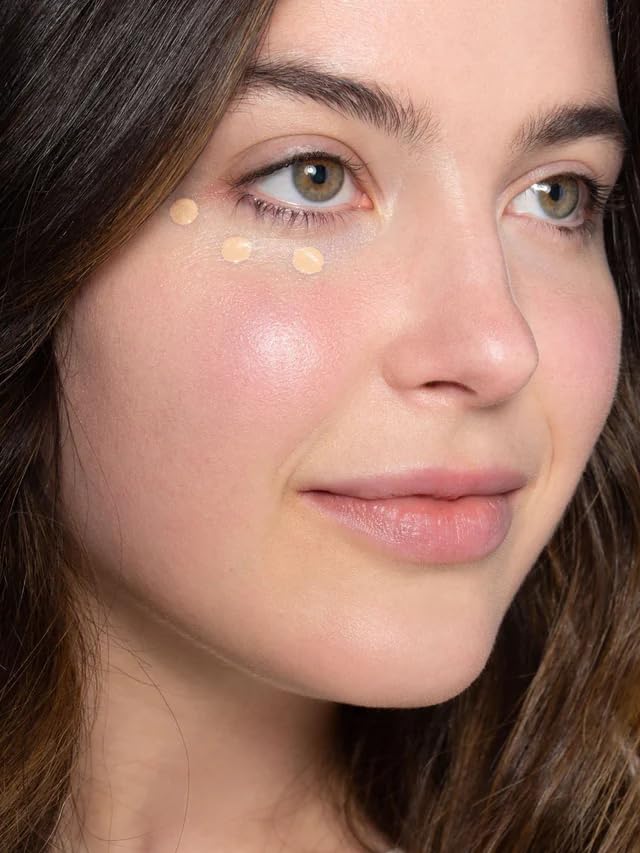 ILIA True Skin Serum Concealer being applied under-eye area for even tone