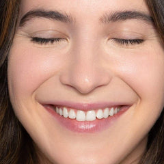 ILIA True Skin Serum Foundation close-up on face highlights seamless blending.
