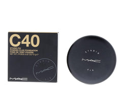 MAC Studio Fix Powder Plus bottle with brush demonstrates one-step skin-perfecting routine
