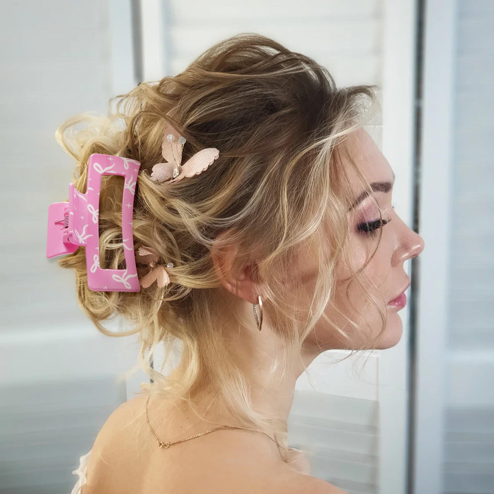 Pinzas Pantide con lazo rosa, elegancia para reuniones y fiestas.