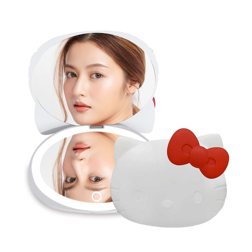 Impressions Vanity Hello Kitty compact mirror closed, purse-ready for on‑the‑go touchups