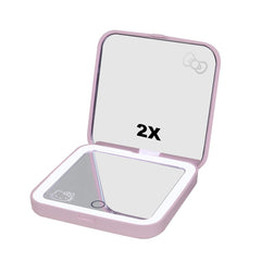 Impressions Vanity Hello Kitty Supercute pink compact mirror featuring a touch sensor switch
