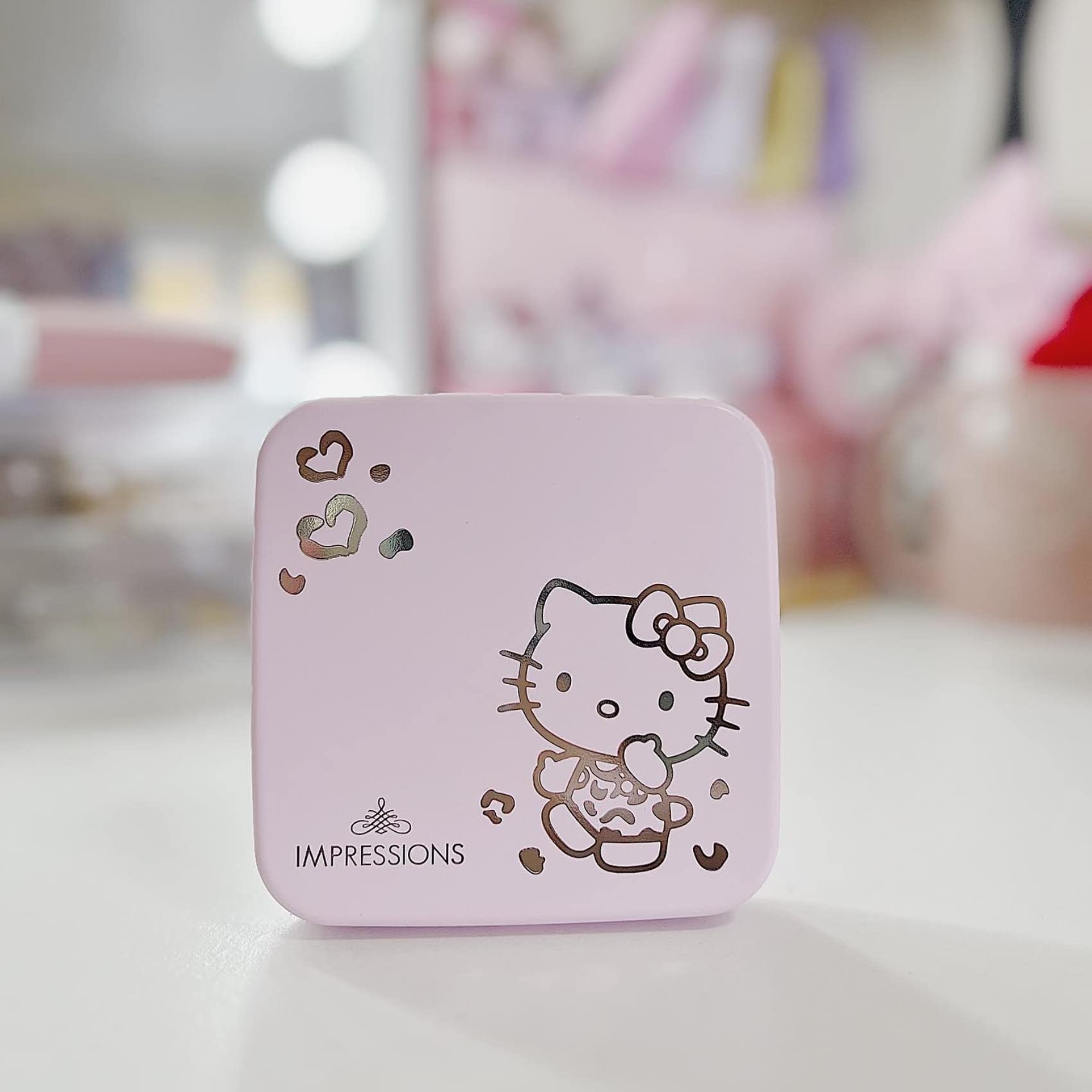 Impressions Vanity Hello Kitty Supercute travel-friendly compact mirror fits purses for on-the-go touch-ups