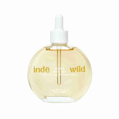 Inde Wild Champi Hair Oil bottle emphasizes nourishing scalp care and growth support