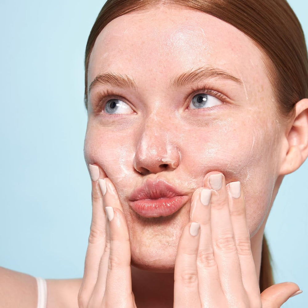 Indie Lee Brightening Cleanser foamy lather ready for cleansing ritual.