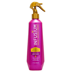 Infusium Repair and Replenish bottle pour demonstrates hydrating leave-in care for smooth styling.
