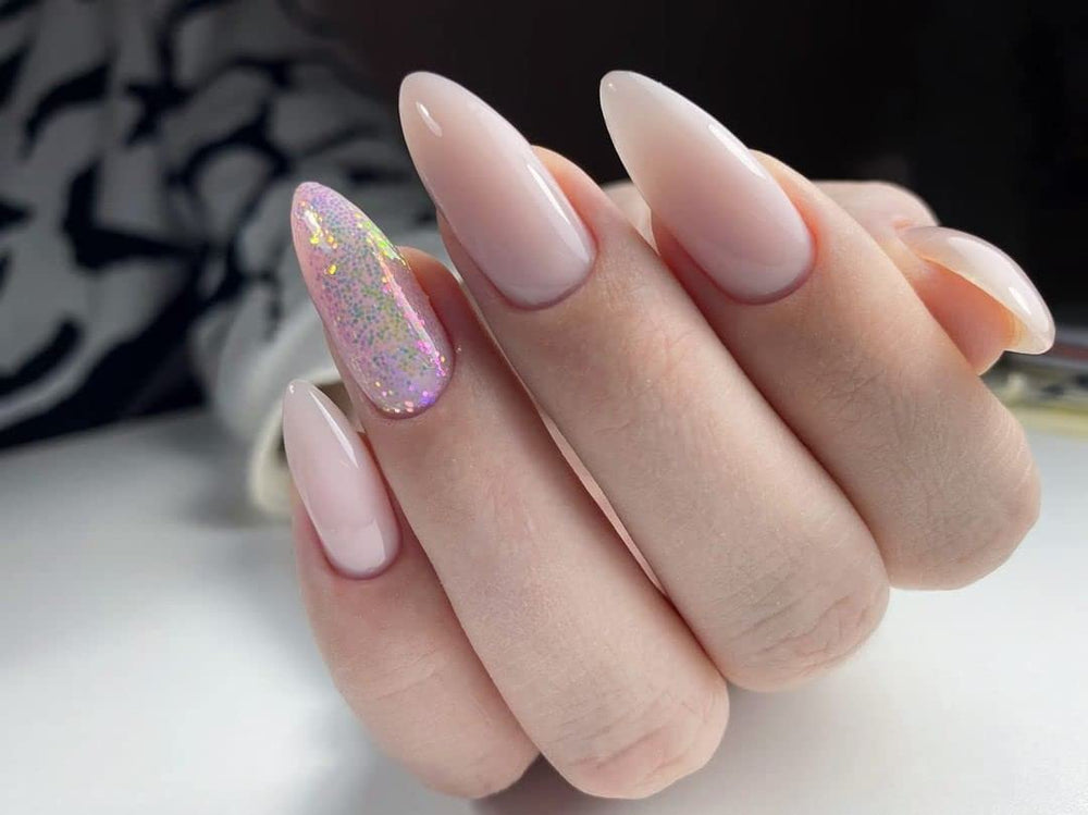 IN.HYPE Builder Gel overlay nails demonstrates protective layer for natural nails with a flattering pink finish.