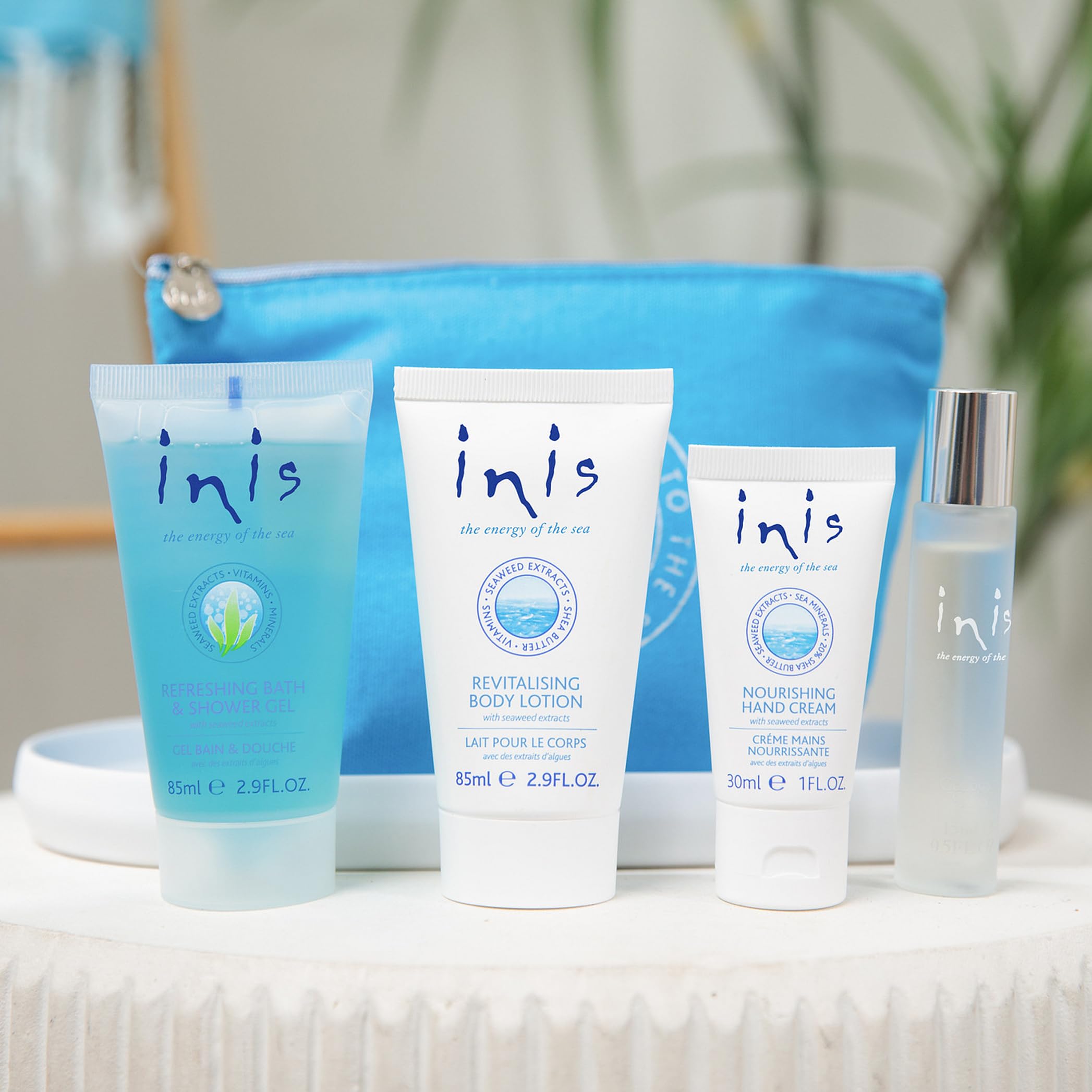 Inis brand logo close-up reflecting Ireland-inspired fragrance heritage