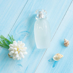 Inis Energy of the Sea glass pebble bottle reflects premium sea-inspired aesthetics