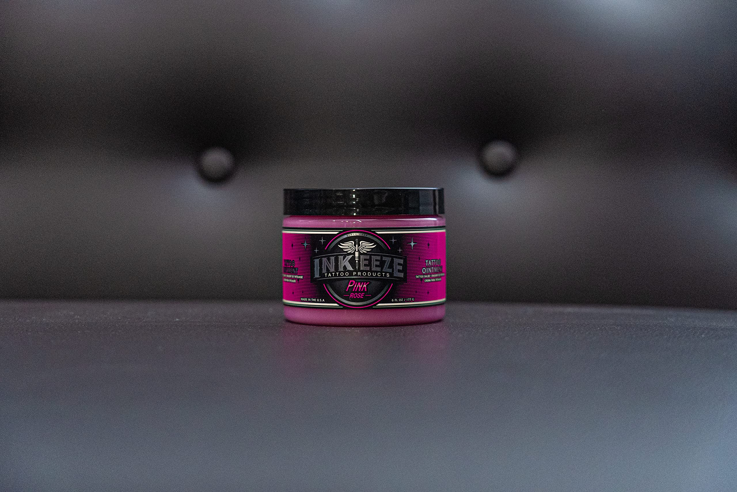 INK-EEZE Pink Tattoo Ointment texture closeup showing creamy consistency