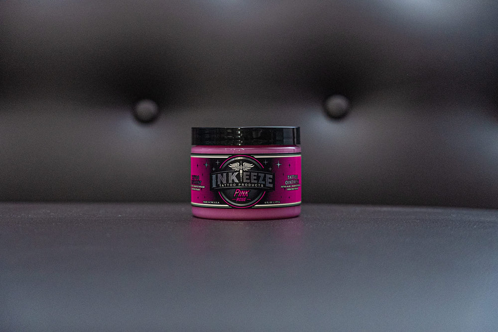 INK-EEZE Pink Tattoo Ointment texture closeup showing creamy consistency