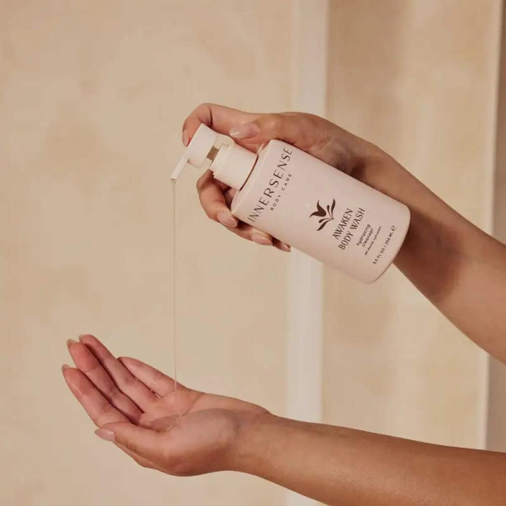 INNERSENSE Awaken Body Wash close-up shows natural ingredients and creamy gel texture.