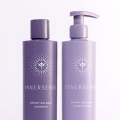 INNERSENSE Bright Balance Conditioner bottle demonstrates moisture-rich, brass-neutralizing formula for cool tones