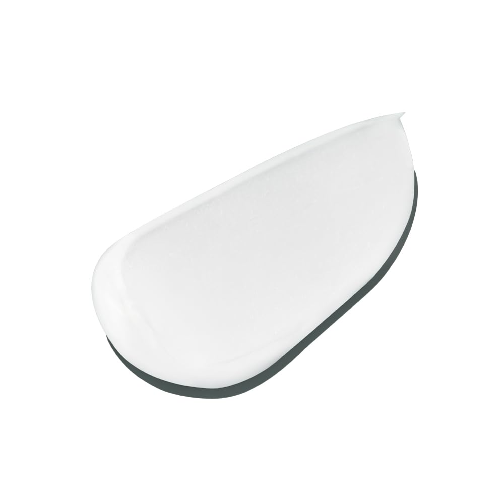 INNERSENSE cream conditioner applied to the palm for even distribution on mid-lengths to ends.