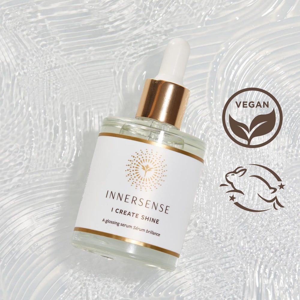 INNERSENSE Glossing Serum hand application shows fast absorption and radiant texture.