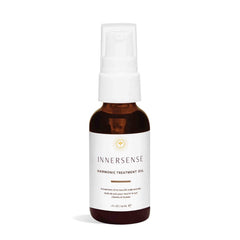 INNERSENSE Natural Harmonic Treatment Oil bottle nourishes scalp.