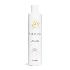 INNERSENSE Quiet Calm Curl Control bottle reduces frizz for defined curls.