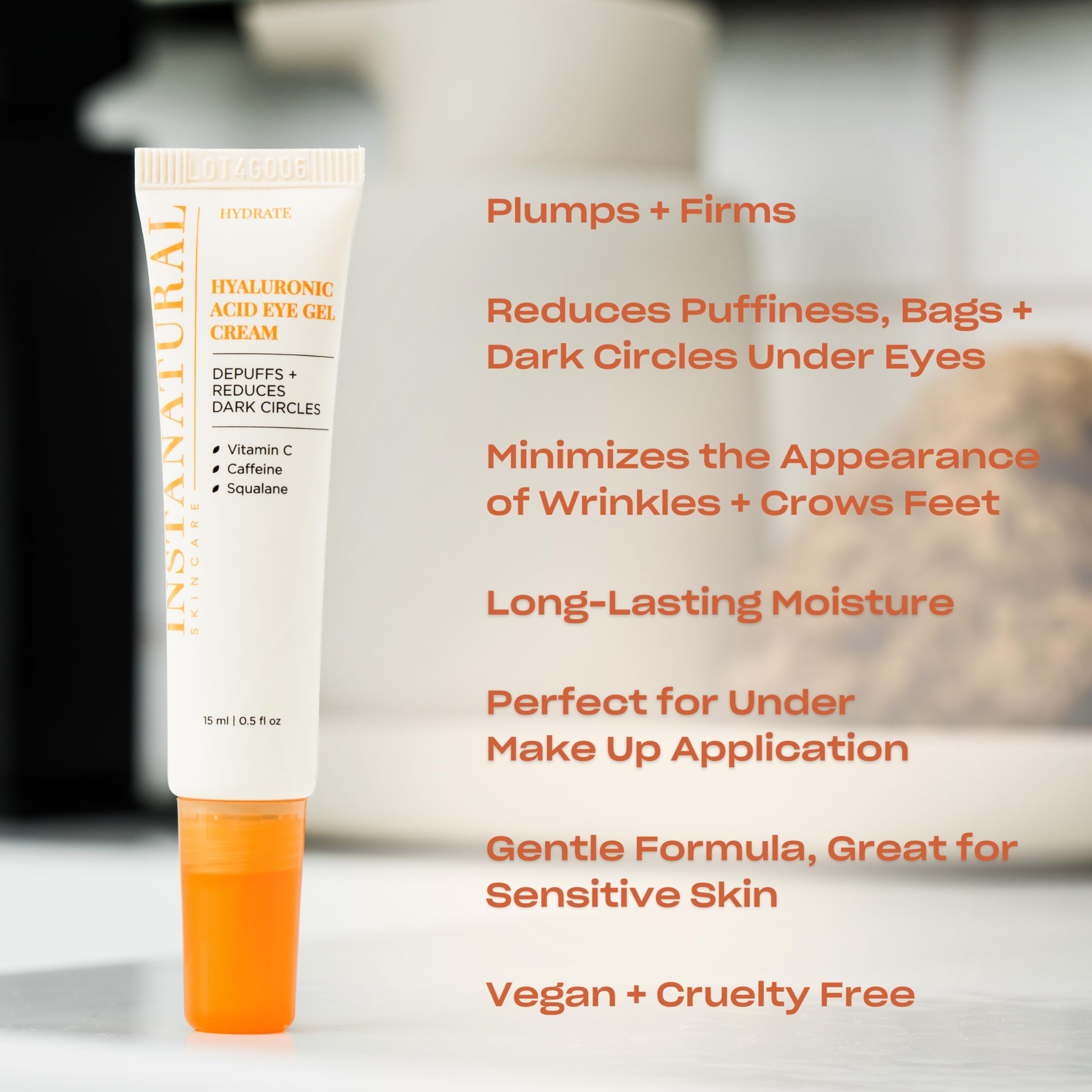 InstaNatural Hyaluronic Acid Eye Gel Cream application on skin demonstrating puffiness smoothing.