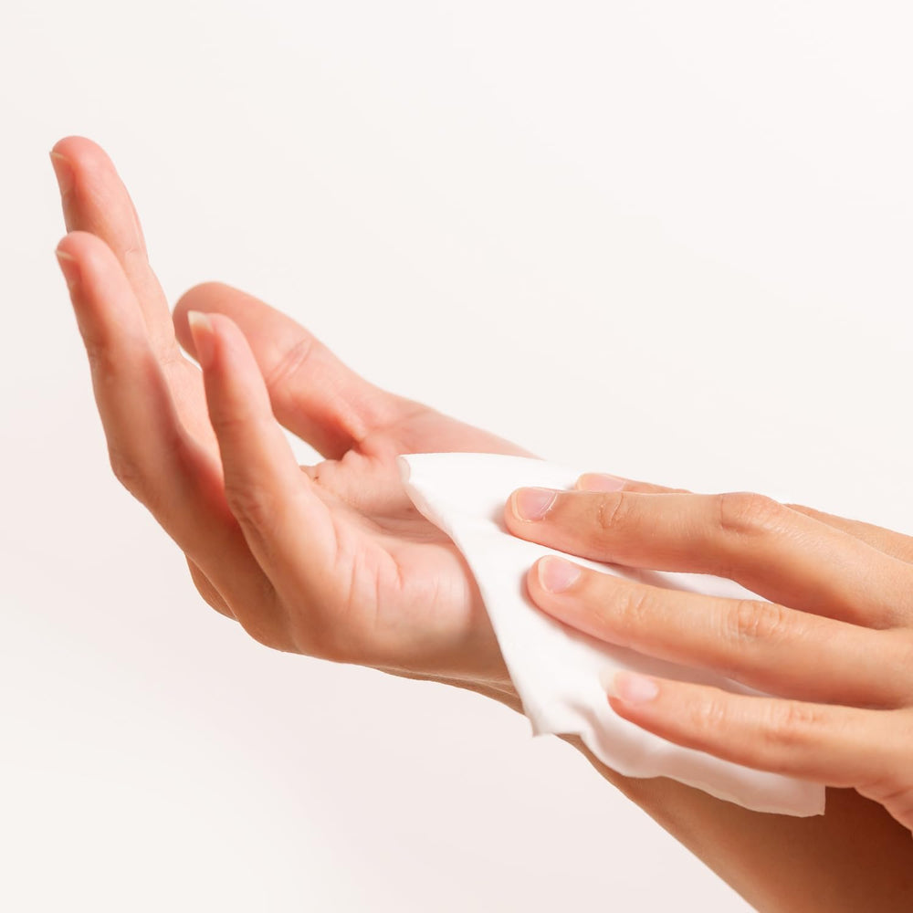 Intrinsics pad in use on face for gentle makeup removal.