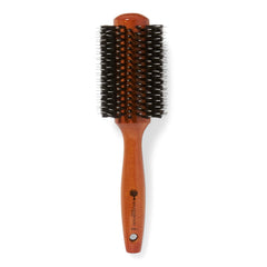 Ion Golden Wood Round Brush closeup on handle for salon-quality blowouts and shine.