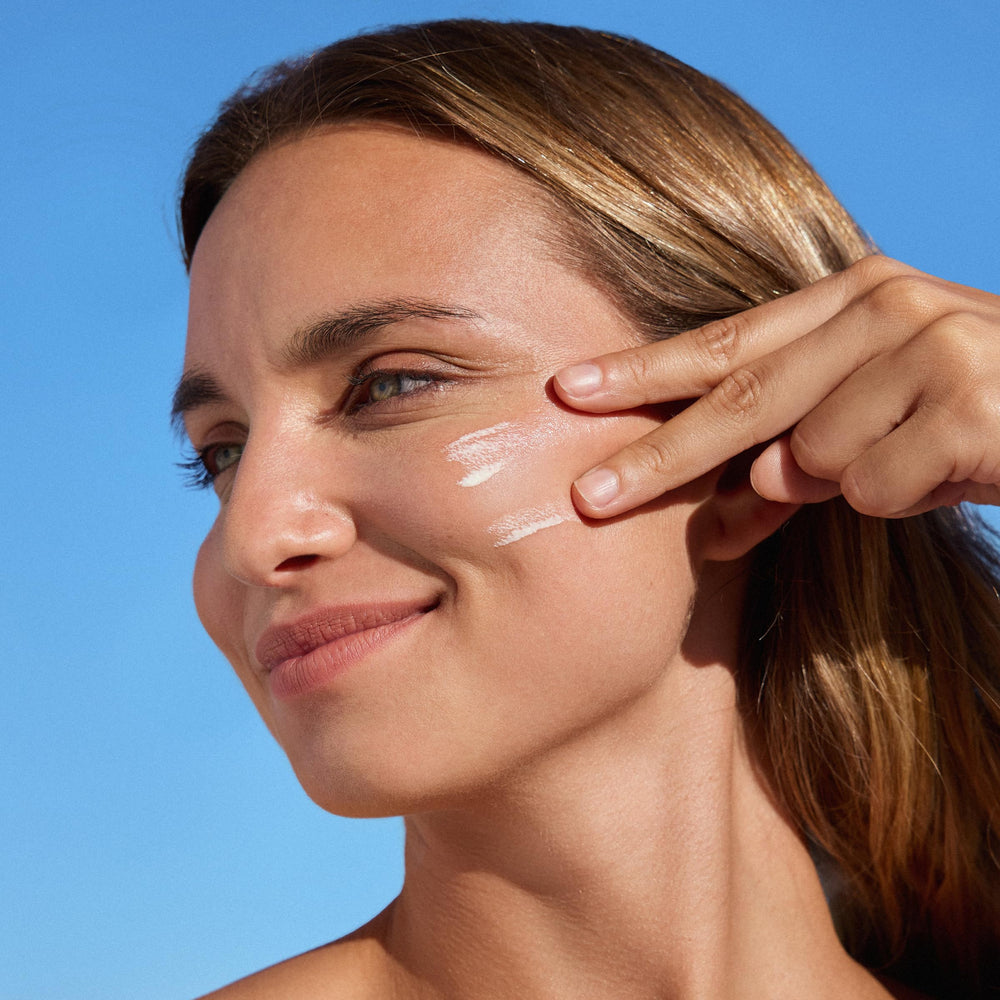 ISDIN Fusion Water MAGIC lightweight texture shown on skin during application
