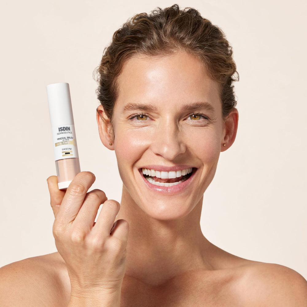 ISDIN Mineral Brush Powder applying motion demonstrates circular technique for even release and seamless coverage.