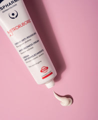 IsisPharma Metroruboril A.Z tube-application scene showing lightweight soothing formula