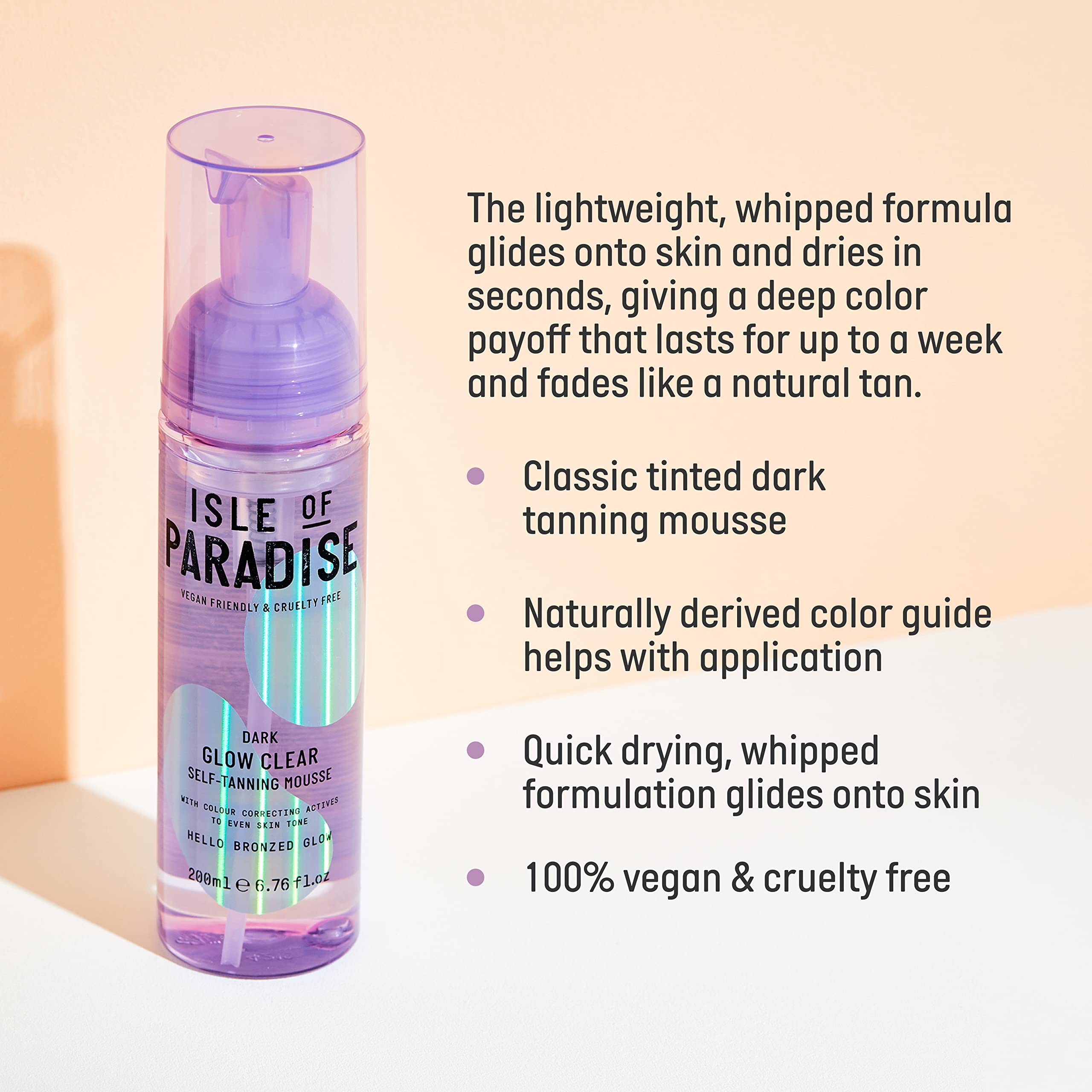 Isle of Paradise Glow Clear Self-Tanning Mousse application mitt ready for even coverage