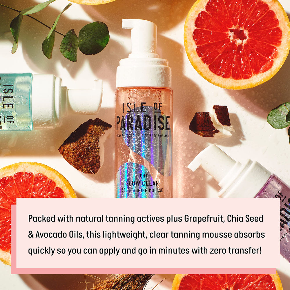 Isle of Paradise Glow Clear Self-Tanning Mousse being swiped on skin for smooth application