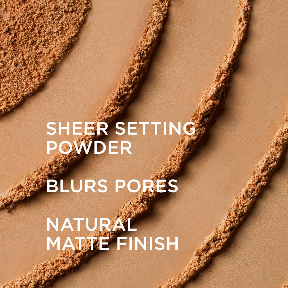 IT Cosmetics brush applying powder to face demonstrating easy, even coverage benefit