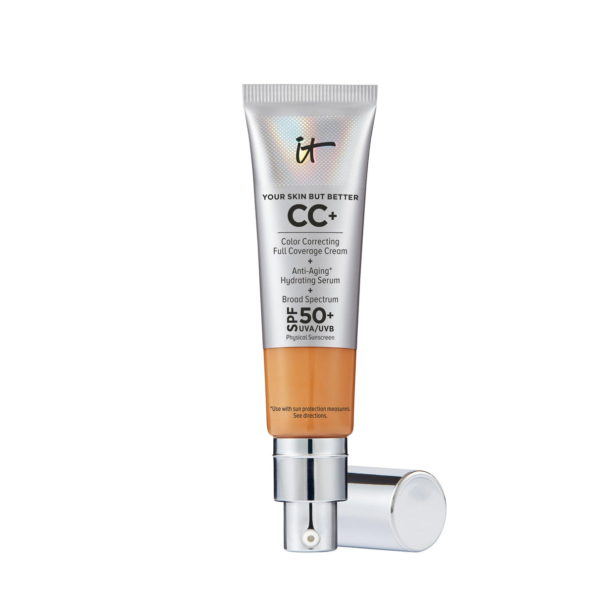 IT Cosmetics CC+ Cream Tan bottle with SPF 50+ protection on skin.
